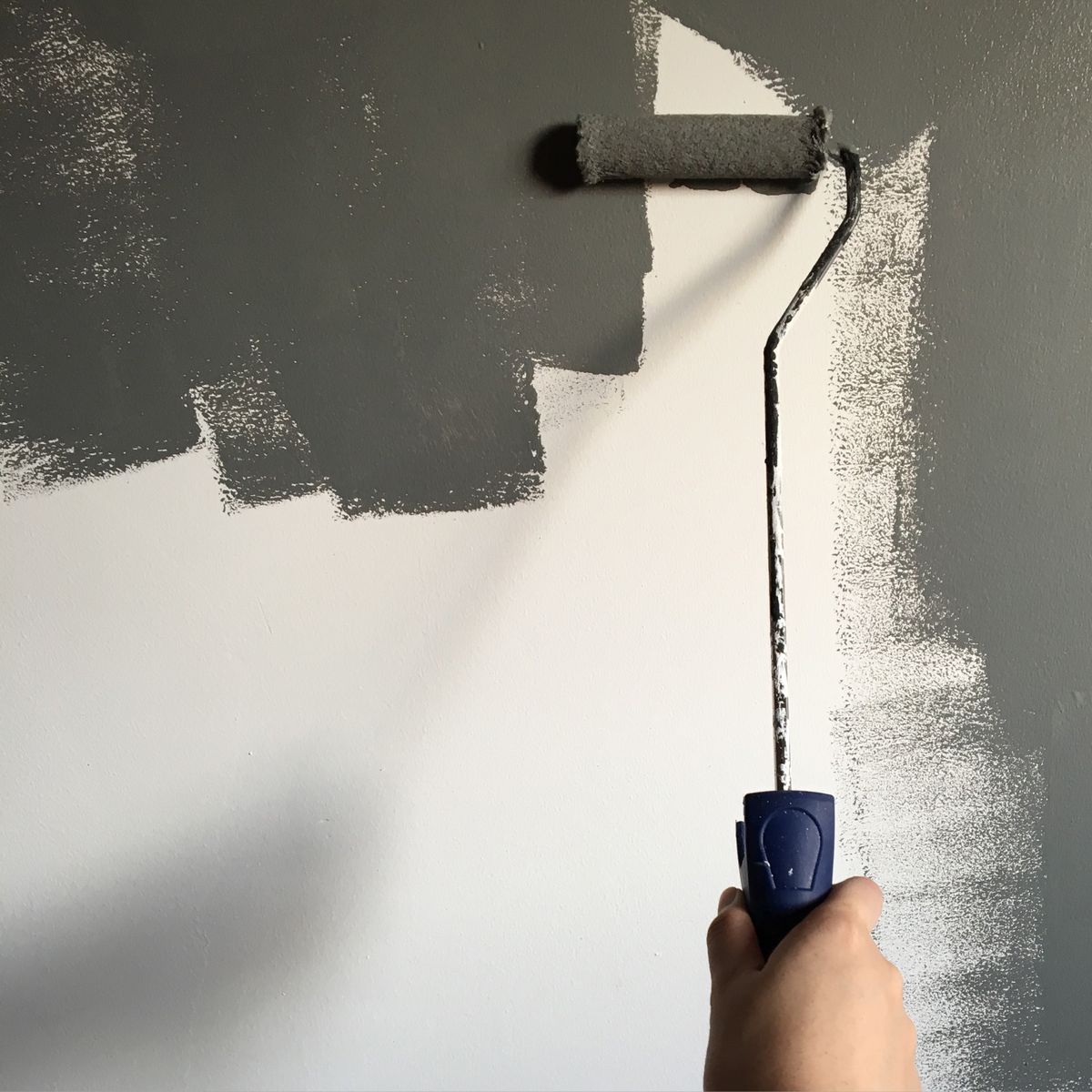 Professional wall painting service in progress